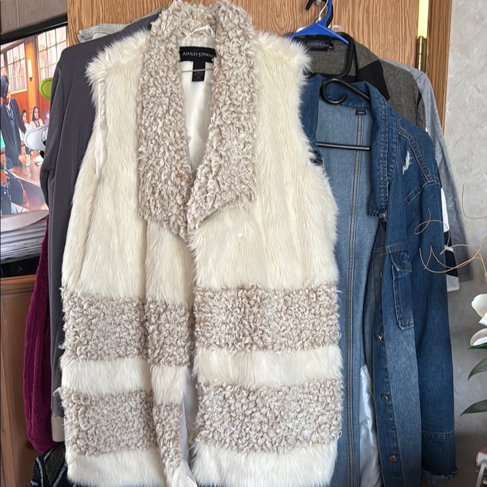 Ashley Stewart 3 quarter length cream fur vest.